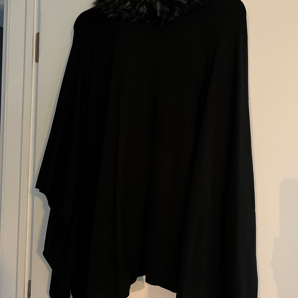 Beautiful wrap with imitation fur collar.